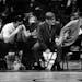 March 28, 1971 Albert Lea coach Paul Ehrhard (right) grasps an assistant's knee in a tense moment. Minneapolis Sunday Tribune