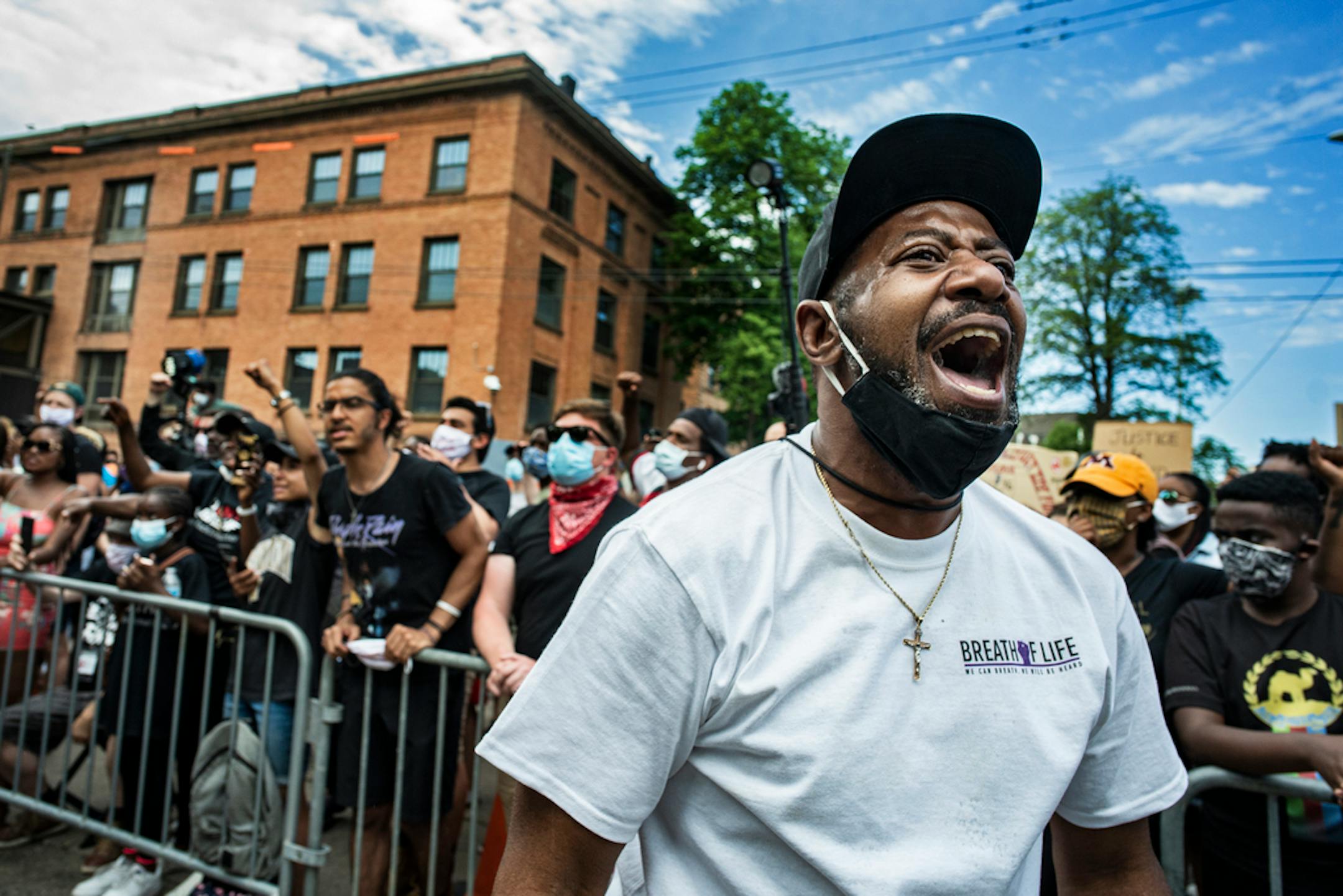 John Thompson, a close friend of Philando Castile, exhorted the crowd to demand justice for George Floyd outside his service at North Central University in Minneapolis on June 4.