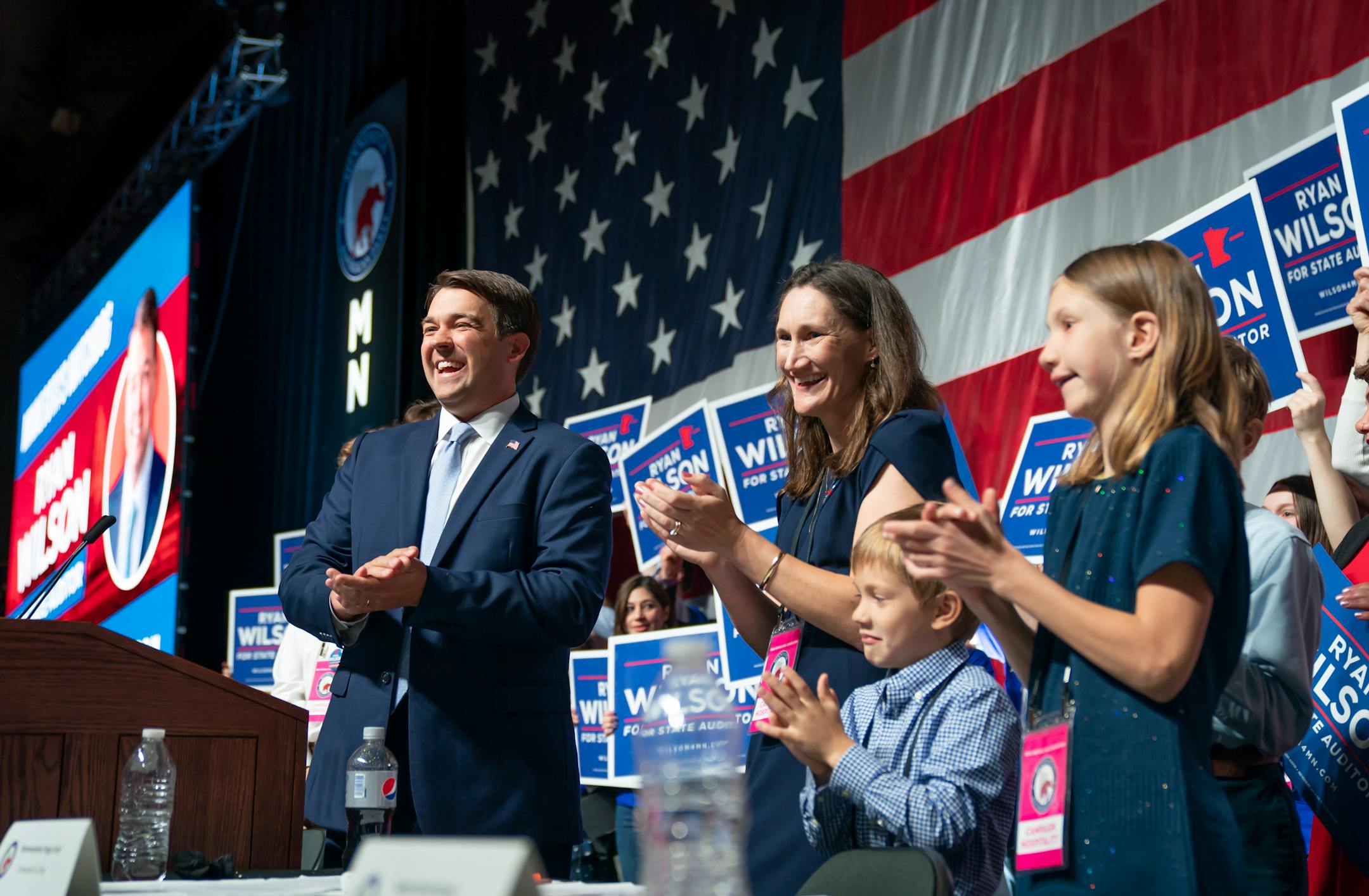 Surrounded by his wife Janelle and their five children, Ryan Wilson accepted the GOP endorsement for state auditor.