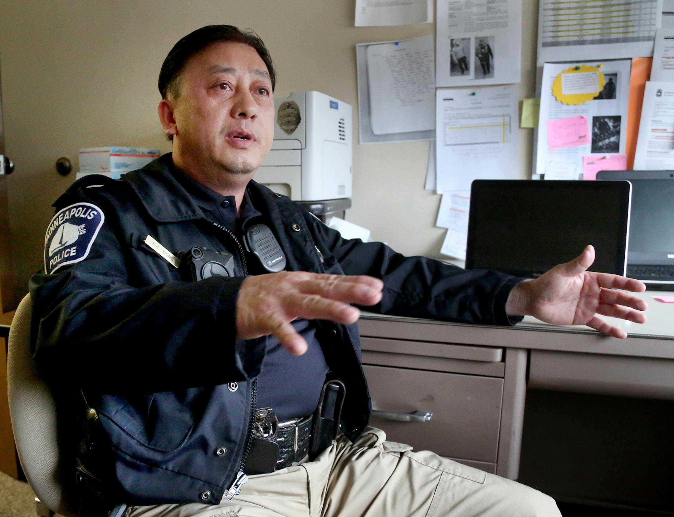 Phillip Xiong, a Minneapolis Police school resource officer (SRO) at Transition Plus High School, talked about his days as a singer as a young man while living with his family in a Thai refugee camp--his family unable to return to their home in Laos because of political instability following the end of the Vietnam War. Xiong was seen in his office at Transition Plus Wednesday, April 26, 2017, in Minneapolis, MN.] DAVID JOLES ï david.joles@startribune.com Minneapolis Police school resource o