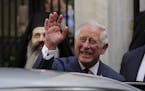 FILE - In this Thursday, May 10, 2018 file photo, Britain's Prince Charles, waves as he leaves a meeting with the head of Greece's Orthodox Church Arc