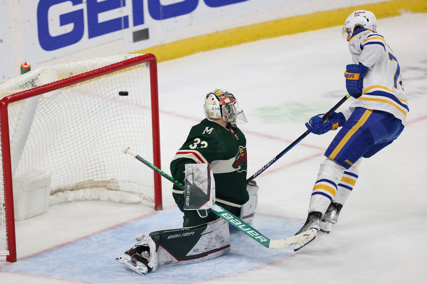 Buffalo Sabres right wing Tage Thompson (72) shoots the puck in the net against Minnesota Wild goaltender Cam Talbot (33) in a shootout during an NHL hockey game Thursday, Dec. 16, 2021, in St. Paul, Minn. (AP Photo/Stacy Bengs)