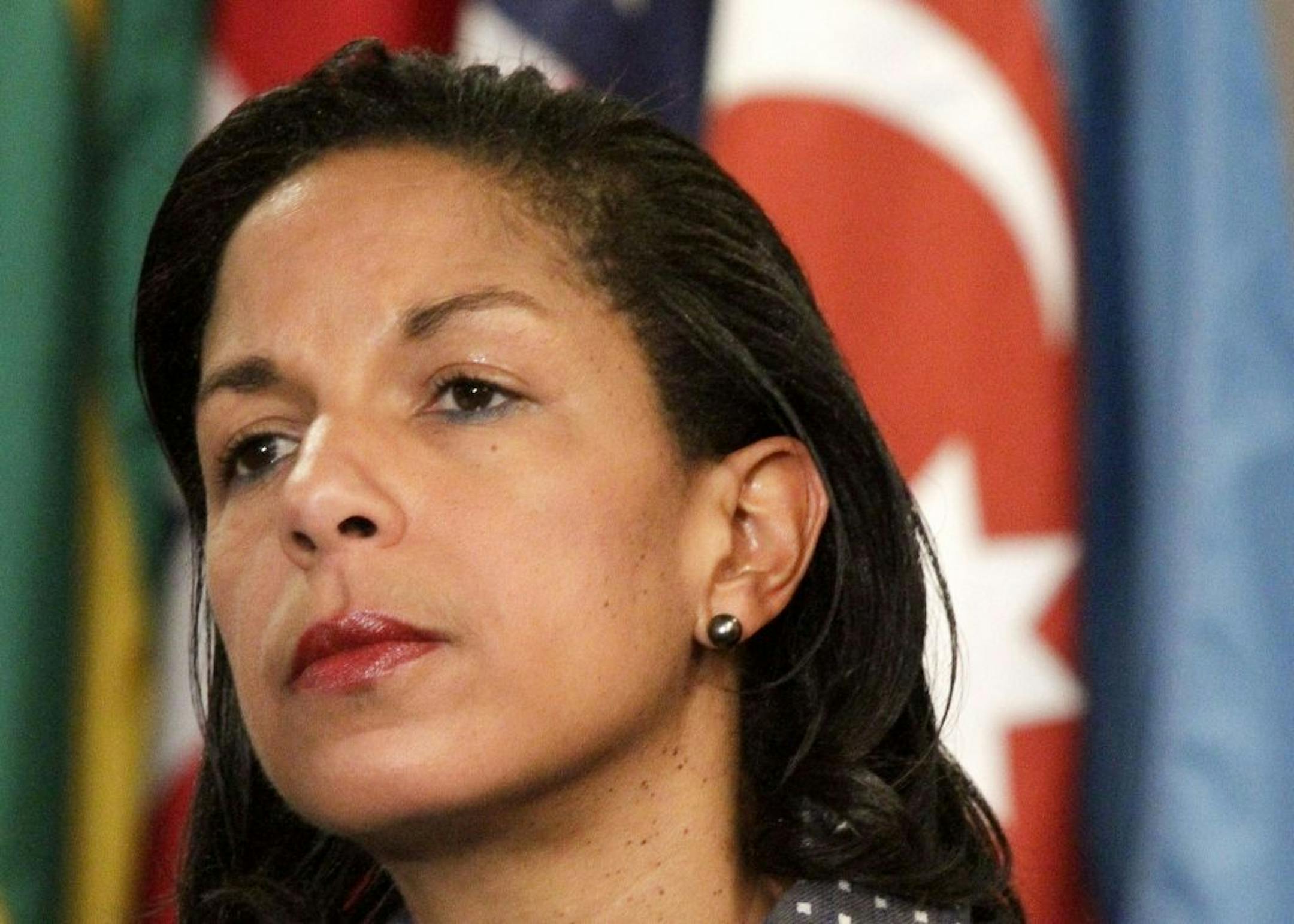 FILE - This June 7, 2012 file photo shows U.S. Ambassador to the U.N. Susan Rice listening during a news conference at the UN. Republican senators' angry criticism of Rice over her initial account of the deadly Sept. 11 attack in Libya smacks of sexism and racism, a dozen female members of the House said Friday.