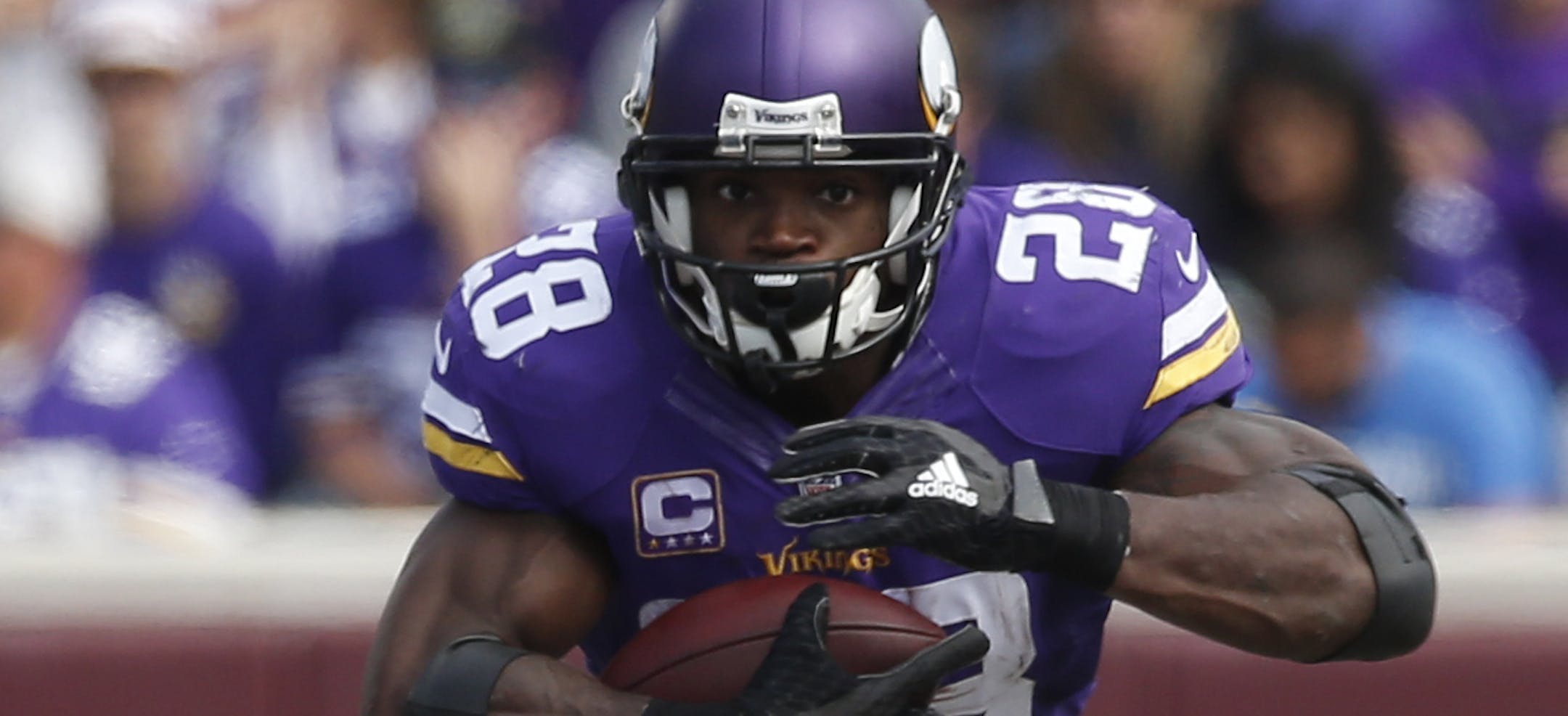 Minnesota Vikings running back Adrian Peterson (28) runs against the Detroit Lions in the second half of an NFL football game in Minneapolis, Sunday, Sept. 20, 2015. (AP Photo/Jim Mone)