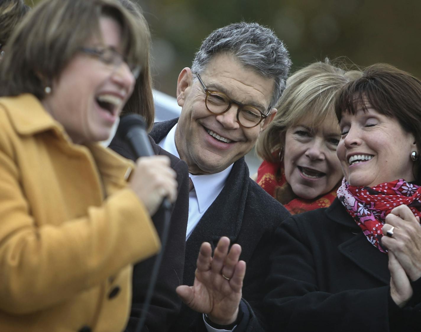 The DFL kicked off its get-out-the-vote bus tour at the State Capitol Wednesday, Oct. 29, 2014, in St. Paul, MN. Here, Sen. Al Franken, second from left to right, Lt. Gov. Tina Smith and Rep. Betty McCollum look on as Sen. Amy Klobuchar, left, addressed those gathered.