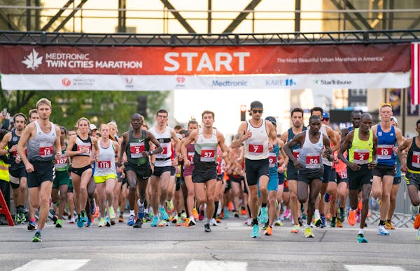 Elite runners took off from the starting line of the 2022 Twin Cities Marathon in Minneapolis.