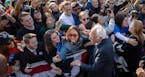 Democratic presidential candidate Sen. Bernie Sanders, I-Vt., shakes hands with supporters at the end of his rally on Saturday, Oct. 19, 2019 in New Y