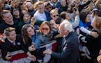 Democratic presidential candidate Sen. Bernie Sanders, I-Vt., shakes hands with supporters at the end of his rally on Saturday, Oct. 19, 2019 in New Y