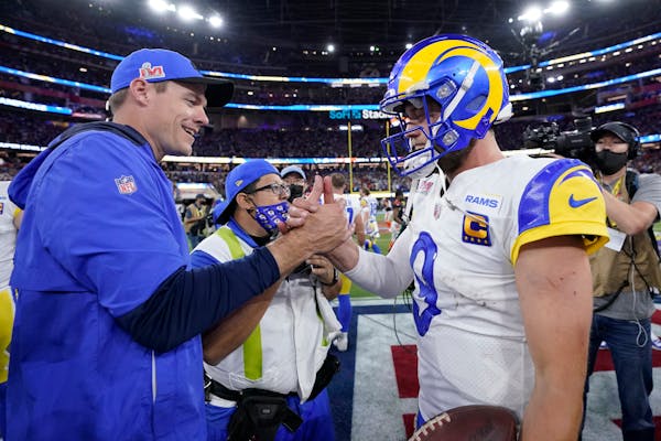 Rams offensive coordinator Kevin O’Connell, left, helped quarterback Matthew Stafford win a Super Bowl. Can he do the same for Kirk Cousins?