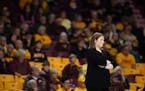 Minnesota head coach Lindsay Whalen watched the game during the second half.