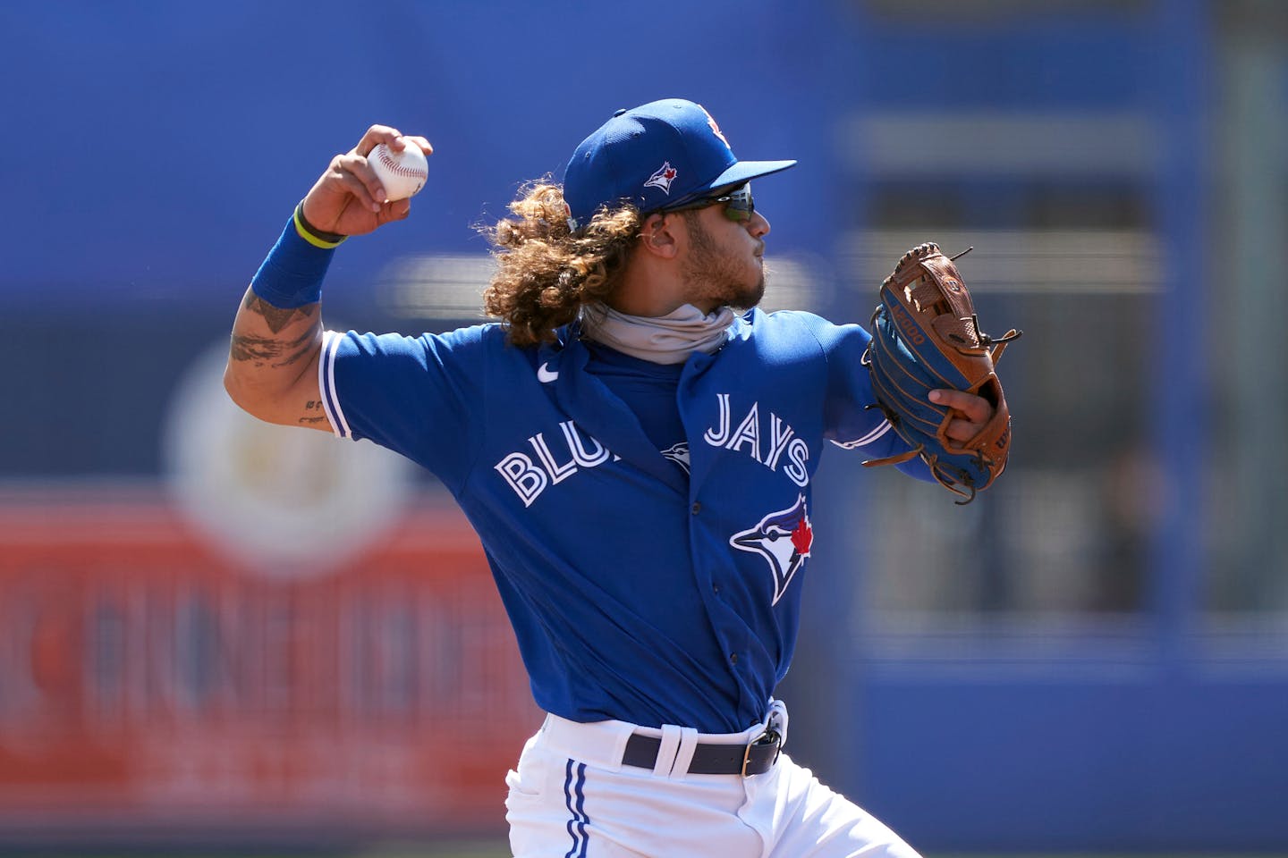 Toronto Blue Jays shortstop Austin Martin (80) warmup throw to first base during a Major League Spring Training game against the Pittsburgh Pirates on March 1, 2021 at the TD Ballpark in Dunedin, Florida. (Mike Janes/Four Seam Images via AP)