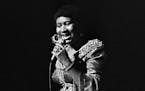 FILE -- Aretha Franklin performs at the Apollo Theater in New York on June 3, 1971. It was not long into Franklin's ascent that she began marshaling t