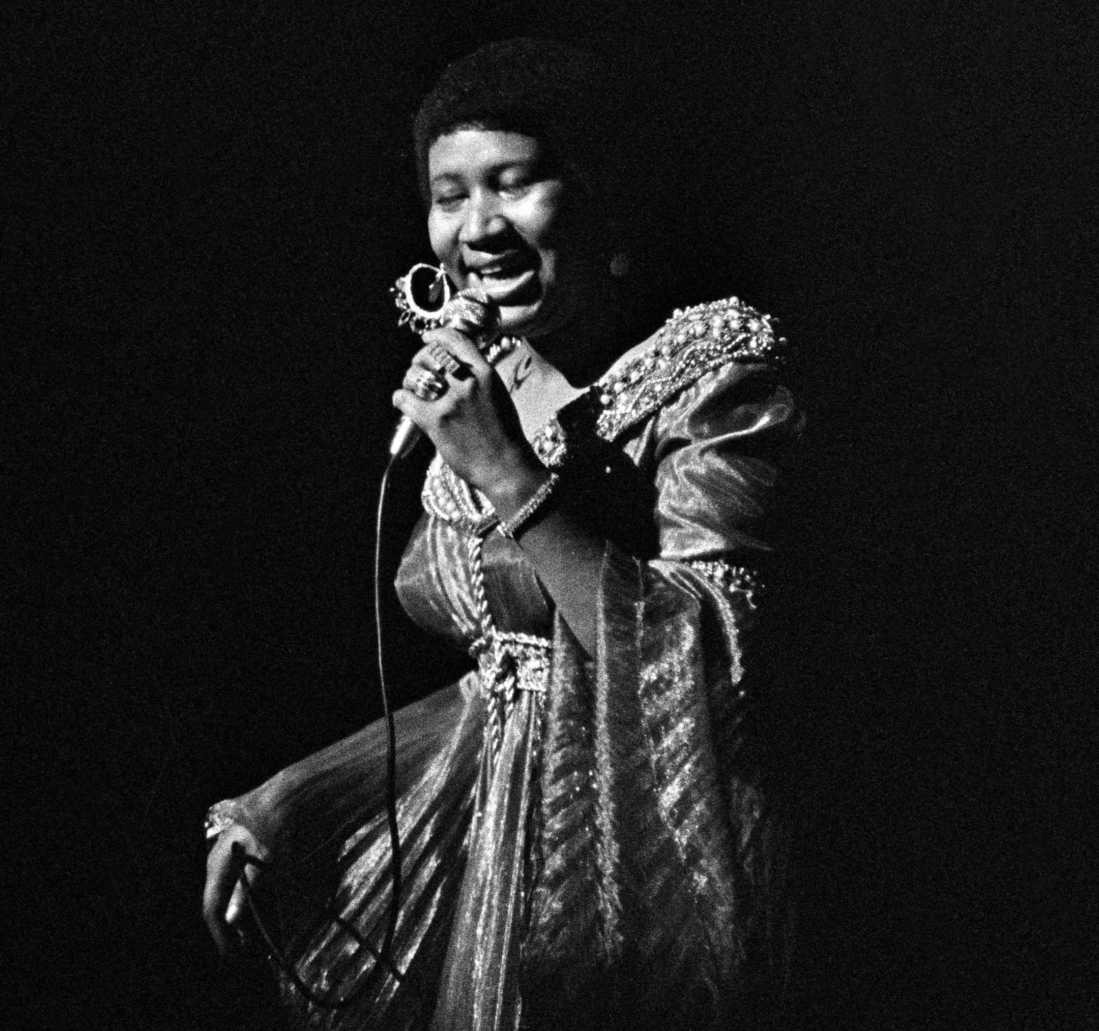 FILE -- Aretha Franklin performs at the Apollo Theater in New York on June 3, 1971. It was not long into Franklin's ascent that she began marshaling the power her nascent stardom commanded to extend the parameters of how we understood and defined black beauty. (Tyrone Dukes/The New York Times)