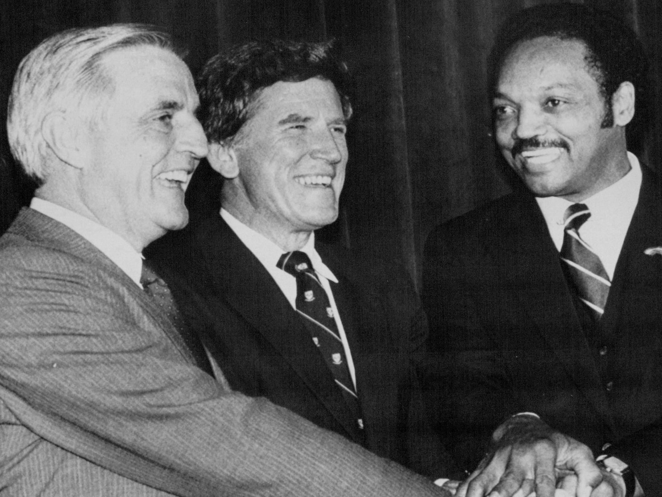 July 17, 1984 HANDS TOGETHER--Former Vice President Walter F. Mondale, left, the likely Democratic presidential nominee, clasps hands with Sen. Gary Hart of Colorado and the Rev. Jesse Jackson, right, after a meeting of the three presidential contenders Monday night in San Francisco. Scott Stewart, AP Laserphoto