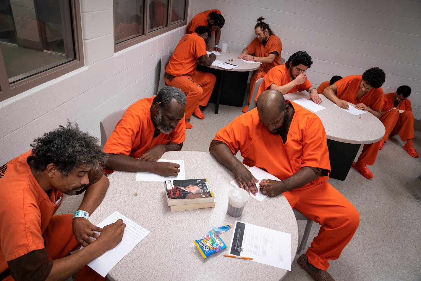 Inmates wrote for a five-minute period during a free writing class at Hennepin County Jail in Minneapolis, Minn. on Tuesday, Sept. 19, 2023. ] LEILA NAVIDI • leila.navidi@startribune.com