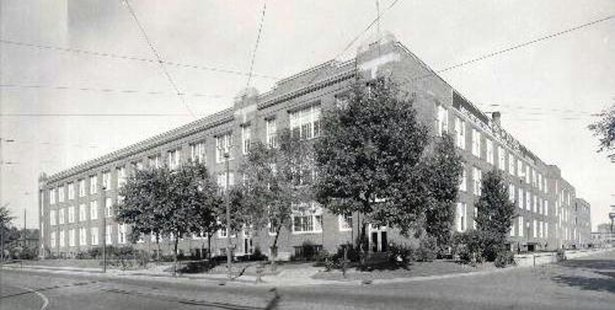 The old bulb factory turned school headquarters is on the block for sale.