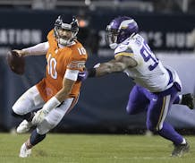 Danielle Hunter chased Bears quarterback Mitch Trubisky during last year's game at Soldier Field.