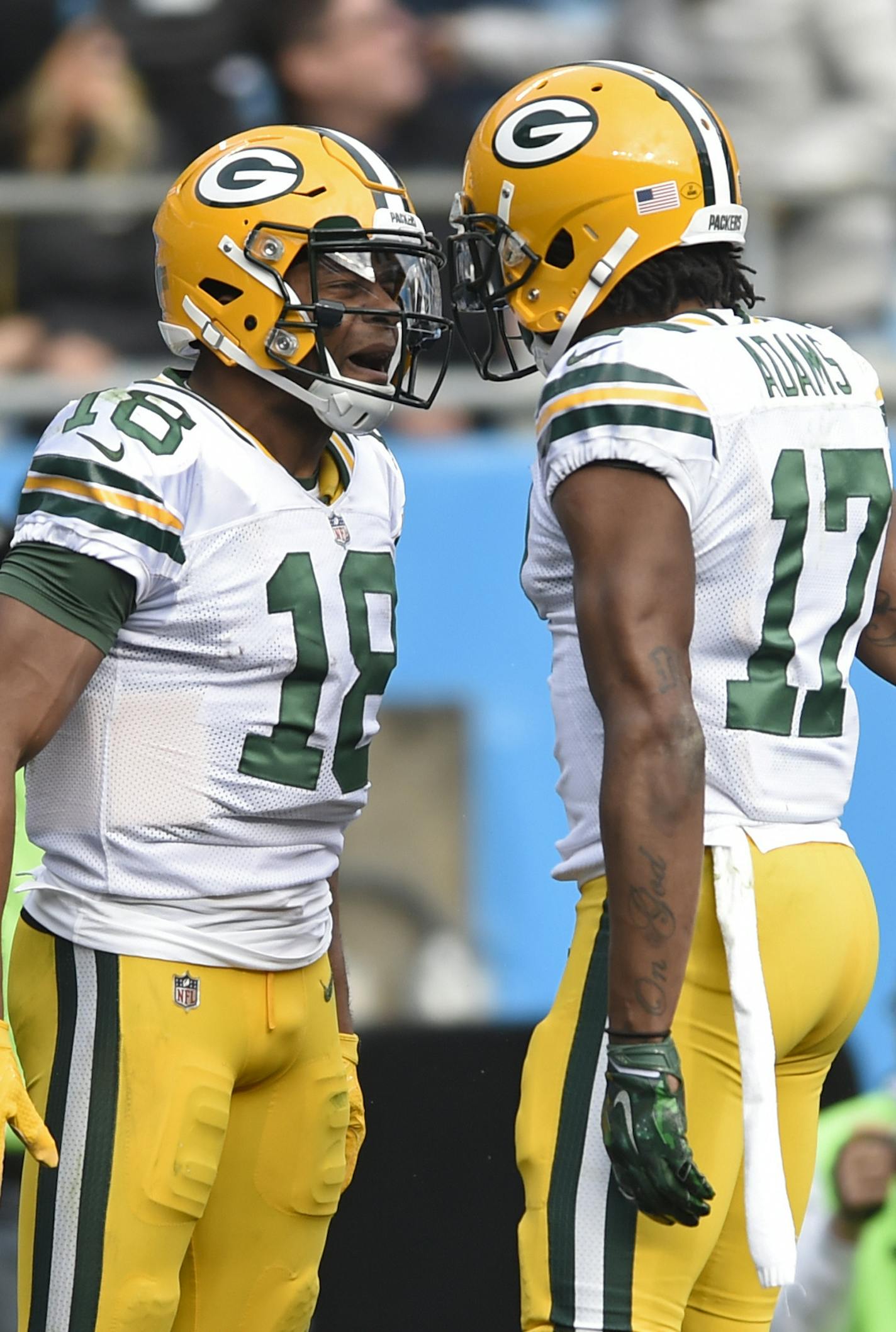 Green Bay Packers' Randall Cobb (18) celebrates his touchdown against the Carolina Panthers with Davante Adams (17) during the first half of an NFL football game in Charlotte, N.C., Sunday, Dec. 17, 2017. (AP Photo/Mike McCarn)