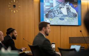 Assistant Hennepin County Attorney Paige Starkey give a video play by play of the evidence against defendant Derrick Thompson as she gives the prosecu
