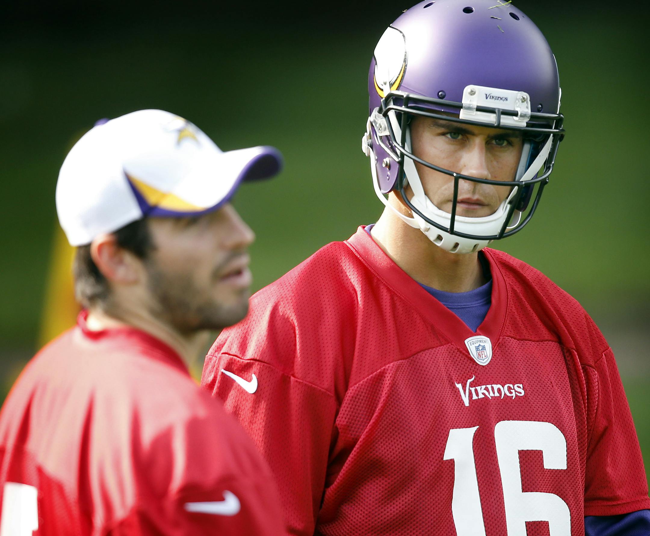 Minnesota Vikings quarterbacks Christian Ponder (7) and Matt Cassel (16) during practice at The Grove in Watford, England on Friday. Quarterback Christian Ponder (7) did not participate in Friday's practice ] CARLOS GONZALEZ cgonzalez@startribune.com September 27, 2013, Watford, England (Minnesota Vikings in London) Vikings practice at The Grove, NFL