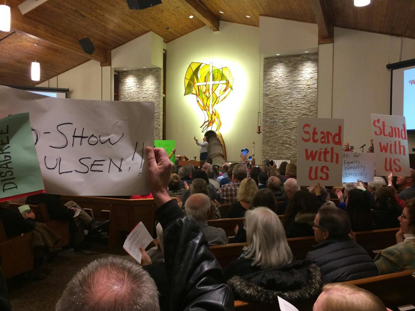 About 600 people frustrated with U.S. Rep. Erik Paulsen packed into Mount Olivet Lutheran Church in Plymouth on Thursday while a few hundred more waited outside.