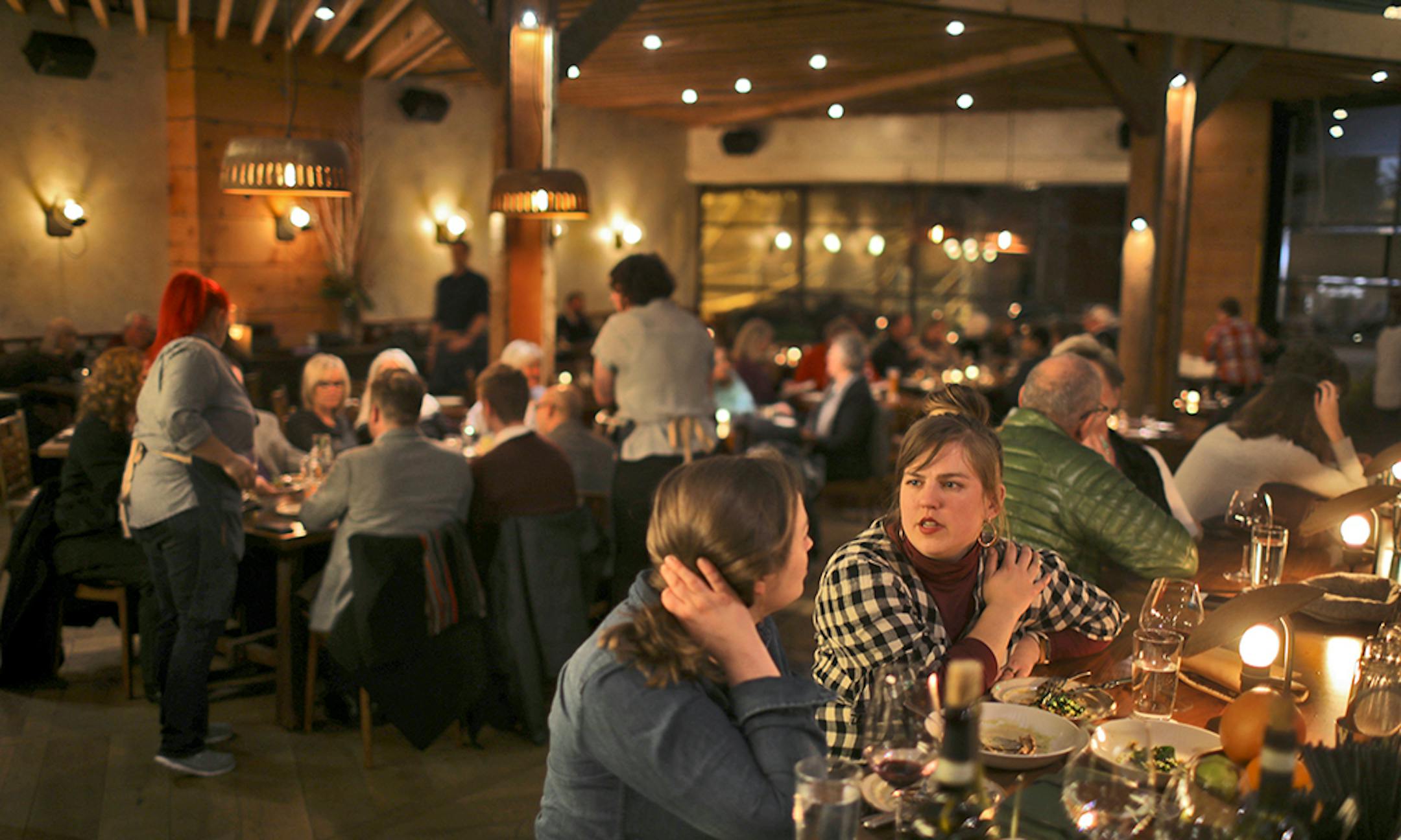 A pair of dines at one of several counter seating areas in the dining room of Young Joni. ] JEFF WHEELER ï jeff.wheeler@startribune.com Young Joni is the Star Tribune's Restaurant of the Year for 2017. The Northeast Minneapolis restaurant was photographed Thursday evening, December 7, 2017.