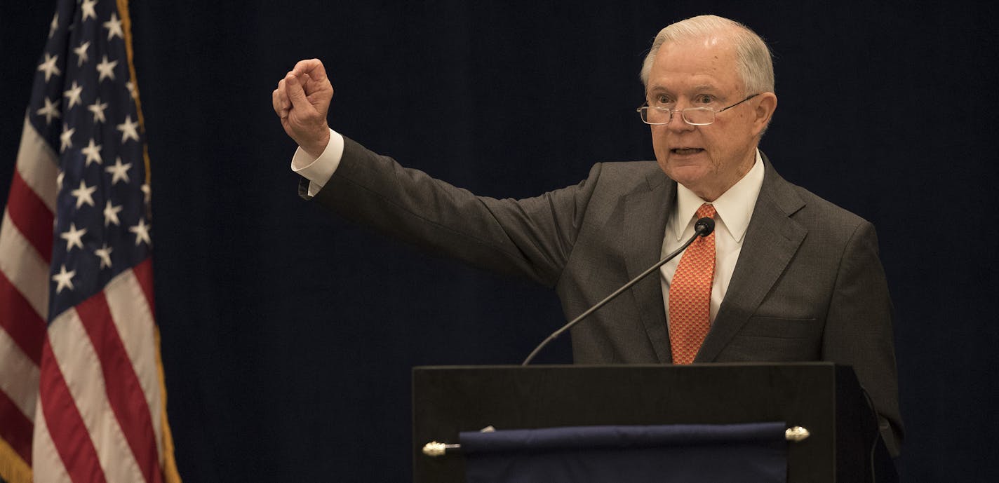 Attorney General Jeff Sessions addresses the summer meeting of the nation's district attorneys from around the country at the Hilton in Minneapolis, Minn., Monday, July, 17 2017. Sessions said the Justice Department will soon make it easier for local law enforcement to seize cash and property from crime suspects and reap the proceeds. (Jerry Holt/Star Tribune via AP) ORG XMIT: MIN2017071720484237