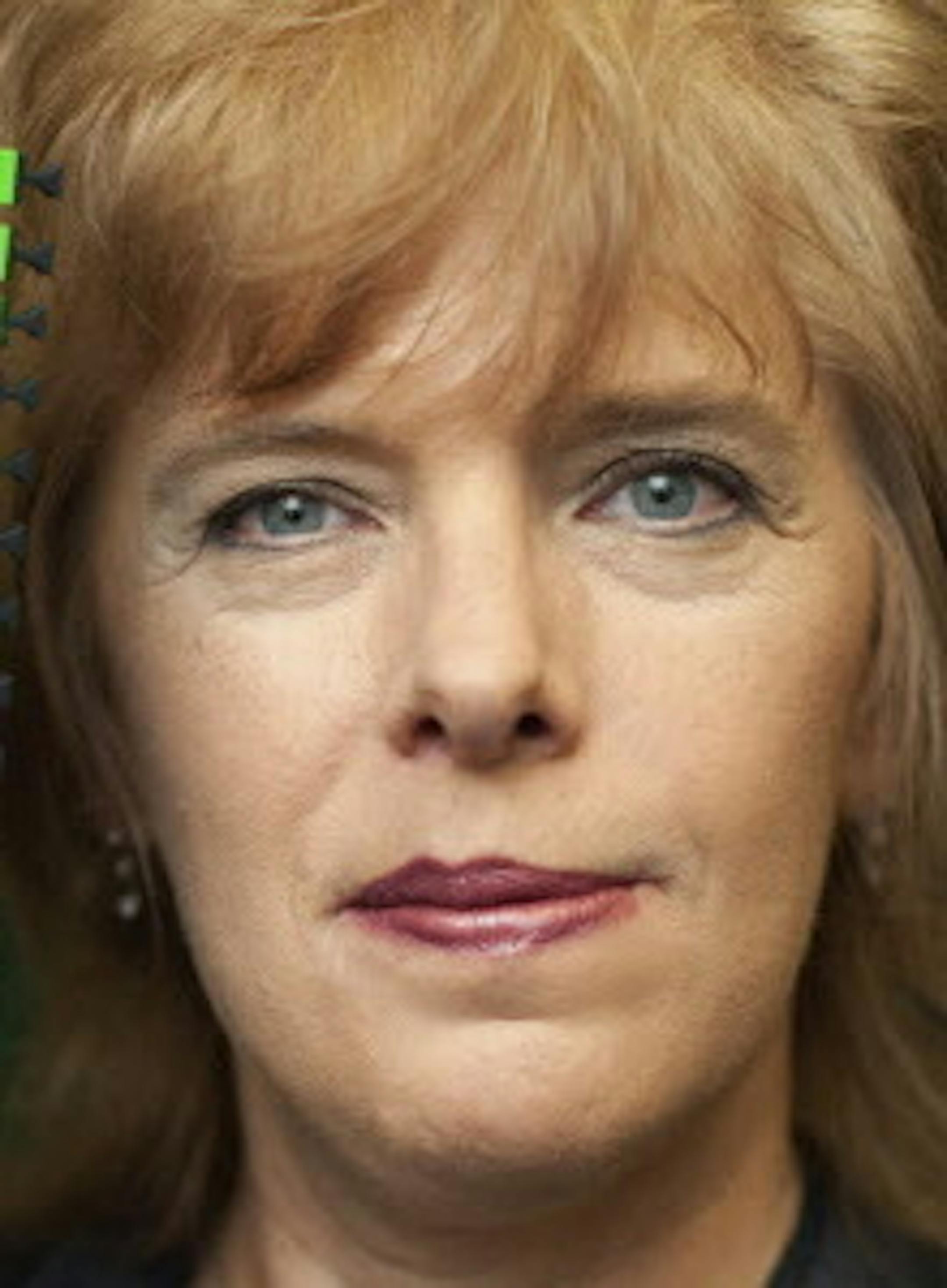 Clearfield CEO Cheri Beranek with the company's signiture device, the Clearfield Cassette which helps customers manage ad protect fiber optic connections. ] GLEN STUBBE * gstubbe@startribune.com