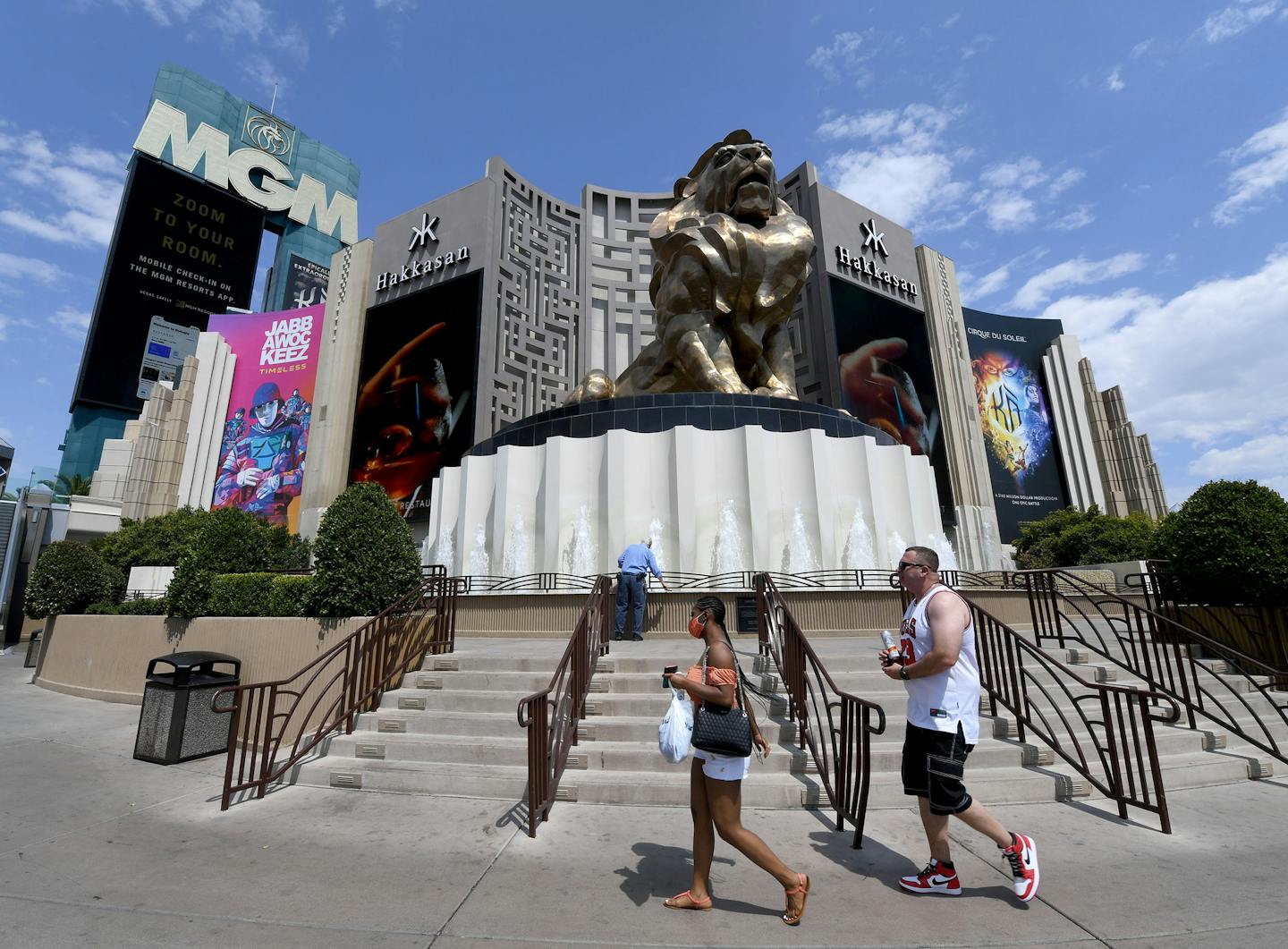 Visitors walk in front of MGM Grand Hotel &amp; Casino on the Las Vegas Strip on August 28, 2020.