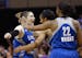 Lindsay Whalen, left, celebrates a win over the Phoenix Mercury with teammates Monica Wright (22) and Maya Moore as time expires in a WNBA Western Con