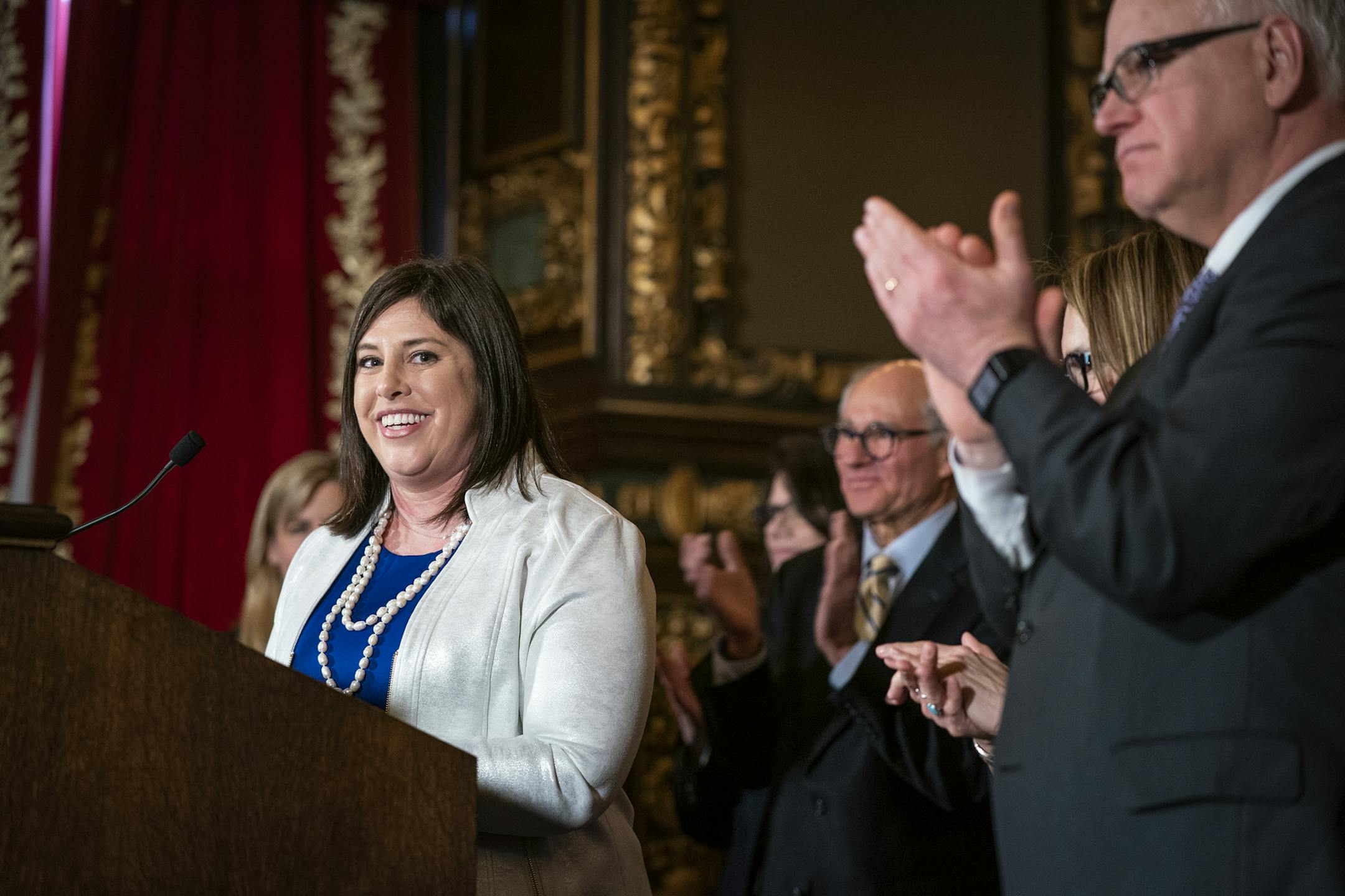 Jenny Teeson receives applause while speaking after the signing. ] LEILA NAVIDI &#xa5; leila.navidi@startribune.com BACKGROUND INFORMATION: Gov. Tim Walz signs into law a repeal of the state's pre-existing relationship defense at the Capitol in St. Paul on Thursday, May 2, 2019. The law was championed through the legislative process by Jenny Teeson, who survived years of sexual assault by her now ex-husband, who used their pre-existing relationship as a defense in court and was ultimately only c