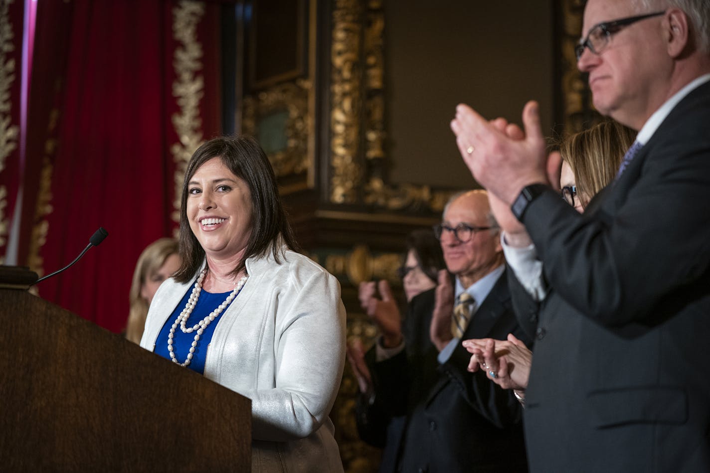 Jenny Teeson receives applause while speaking after the signing. ] LEILA NAVIDI &#xa5; leila.navidi@startribune.com BACKGROUND INFORMATION: Gov. Tim Walz signs into law a repeal of the state's pre-existing relationship defense at the Capitol in St. Paul on Thursday, May 2, 2019. The law was championed through the legislative process by Jenny Teeson, who survived years of sexual assault by her now ex-husband, who used their pre-existing relationship as a defense in court and was ultimately only c