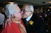 Henryk Gurman, 84, gave his wife, June Harvey, a kiss after he received an honorary teaching license from state Education Commissioner Alice Seagren o