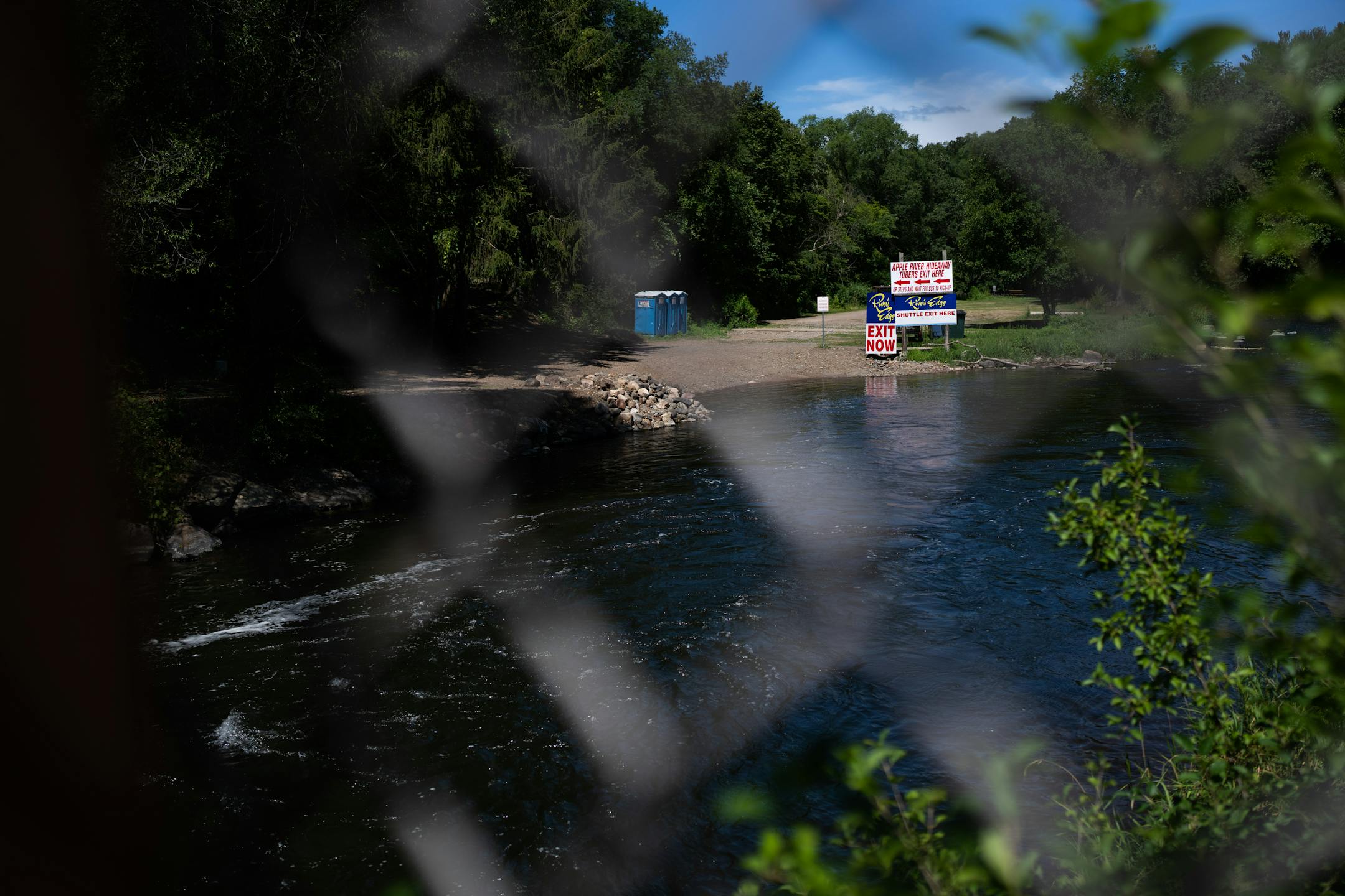 The Apple River flows through Somerset, Wisc. on Monday, Aug. 1, 2022.