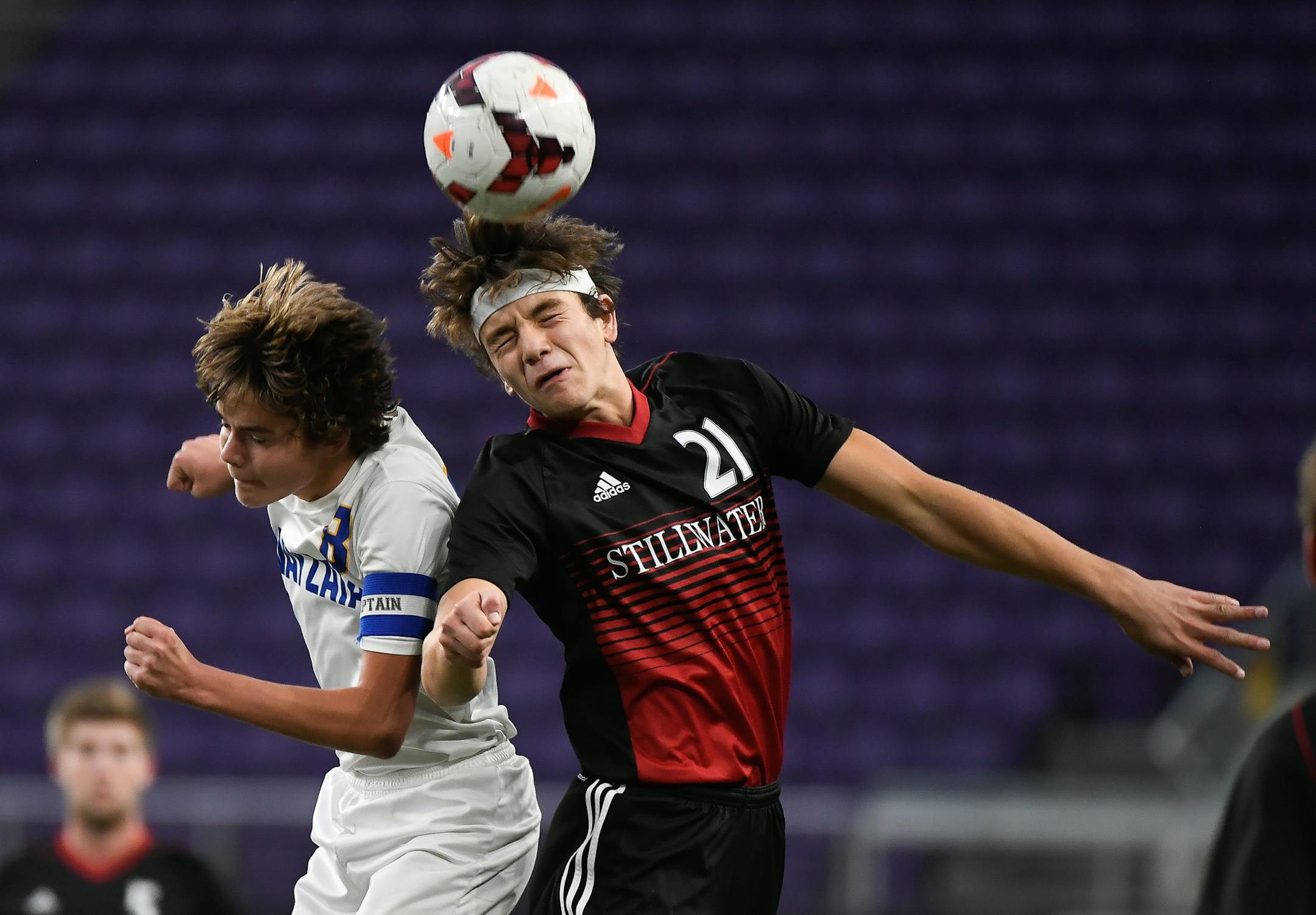 Wayzata midfielder Erik Williams (8) and Stillwater Spencer Scott (21) jumped for a header in the second half Thursday. ] AARON LAVINSKY ï aaron.lavinsky@startribune.com Wayzata played Stillwater in the Class 2A boys' soccer championship game on Thursday, Nov. 2, 2017 at US Bank Stadium in Minneapolis, Minn.