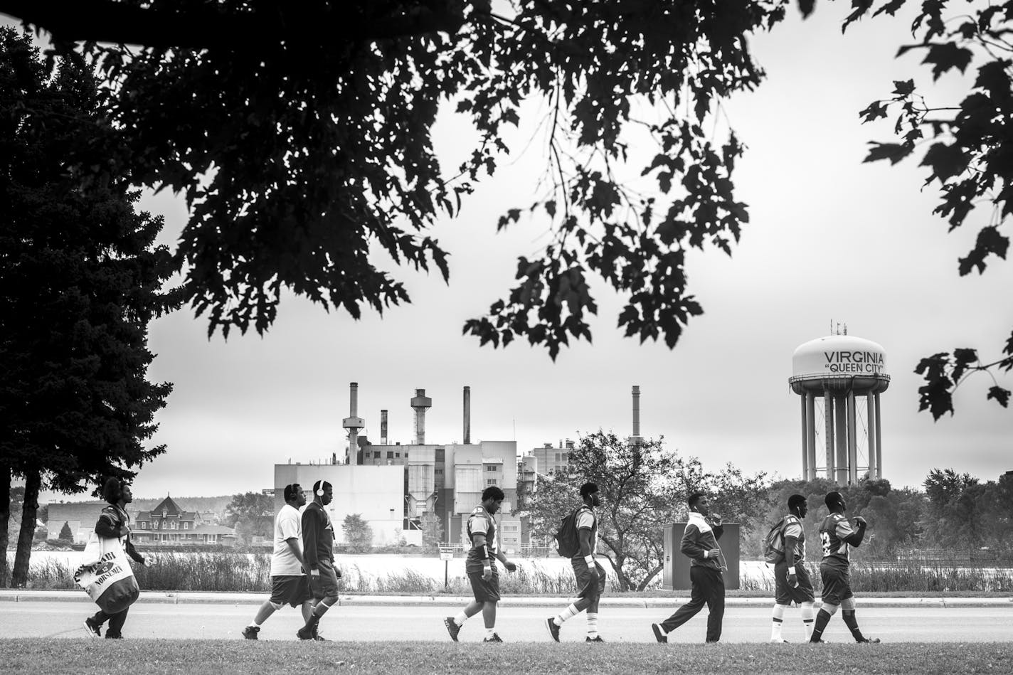 Mesabi Range Players walked to Virginia High School's football field, a path with views of the town water tower and water treatment facility, before taking on Vermillion in late September. Head Coach Dan Lind has them walk through town as a pre-game tradition, ] Aaron Lavinsky &#x2022; aaron.lavinsky@startribune.com Photos to accompany a story on the Mesabi Range College Football team in Virginia, Minnesota. The team, which consists mostly of black athletes recruited from around the country, str