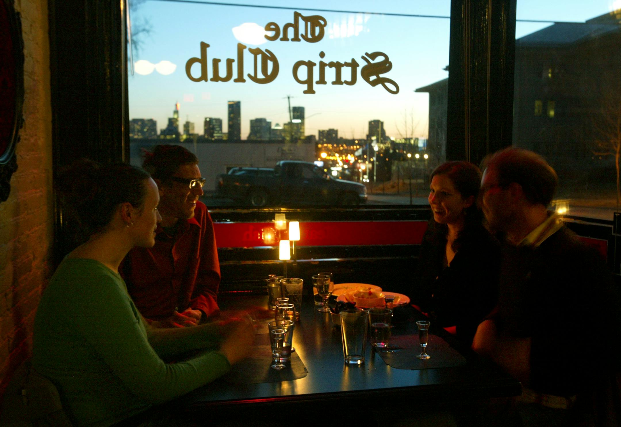 From left, Christine Fankhanel and Matthew Meyer, both of St. Paul, ate at the Strip Club on a recent night with Anna Drennen and Baker Lawley, both of Minneapolis.