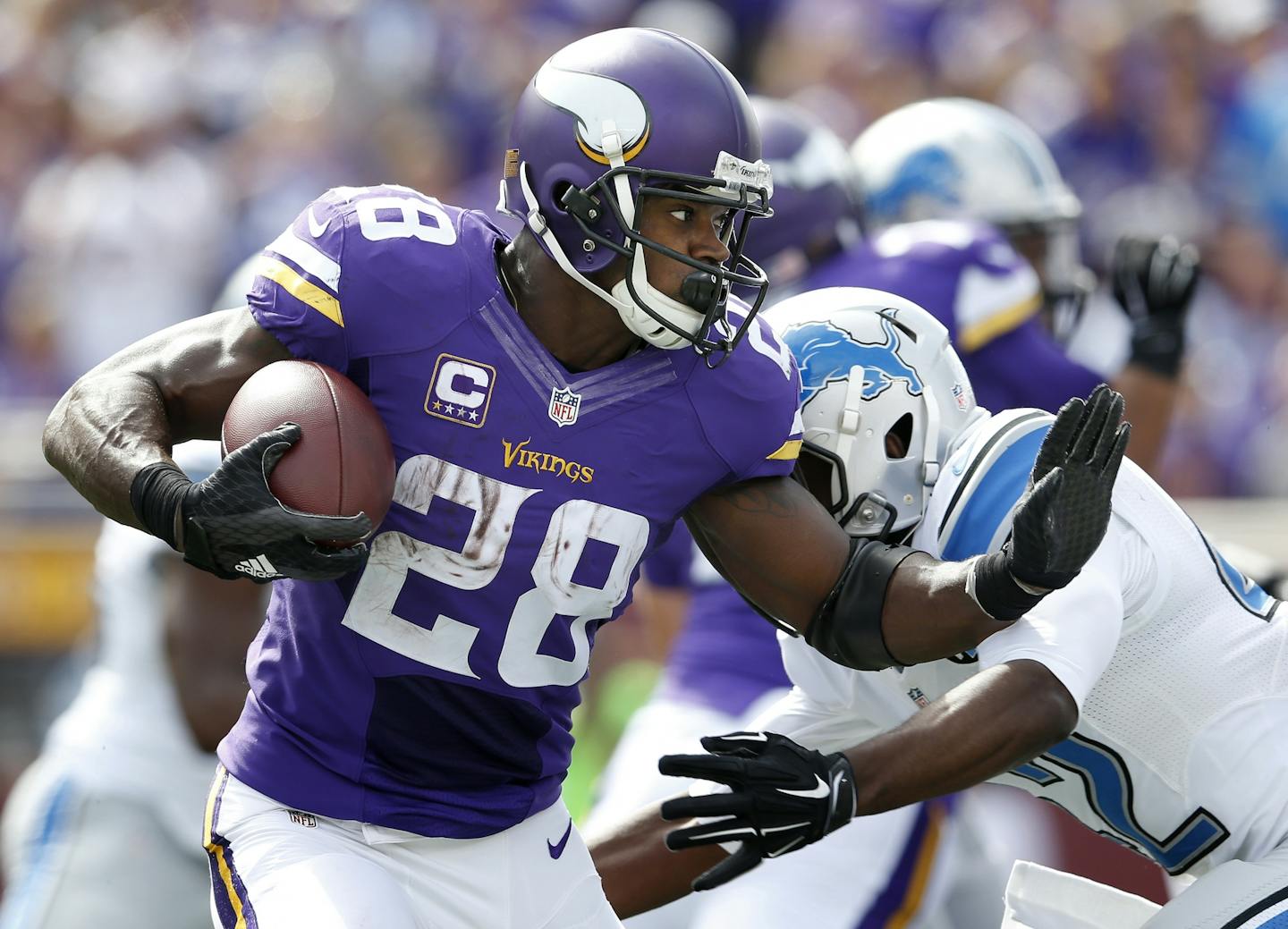 Minnesota Vikings running back Adrian Peterson during one of his second-quarter runs against the Lions.