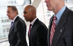 Mohamed Noor, accompanied by his legal team, headed into court last week for the beginning of a trial on murder charges for killing Justine Ruszczyk D