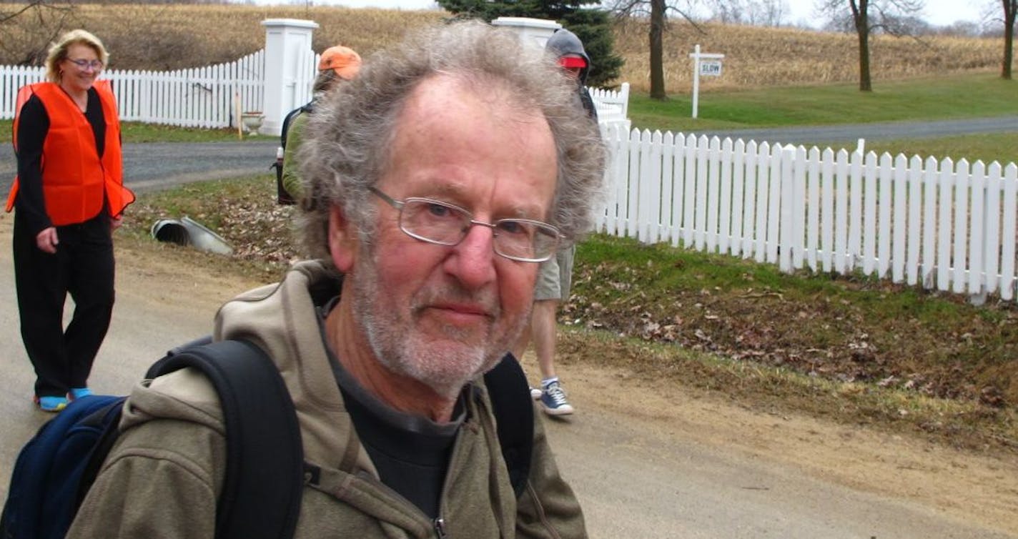 Tom Warth, founder of Books for Africa, was among about 30 walkers on the first leg of a 50-mile journey through Washington County en route to St. Paul.