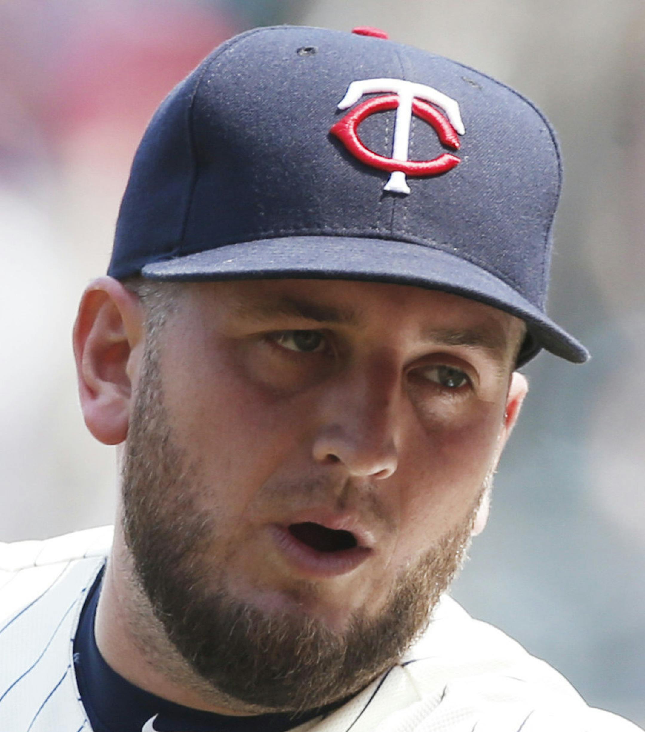 Minnesota Twins pitcher Glen Perkins, left, and catcher Chris Herrmann celebrate the Twins 6-4 win over the Boston Red Sox in a baseball game, Wednesday May 27, 2015, in Minneapolis. Perkins got the save. (AP Photo/Jim Mone) ORG XMIT: MNJM109