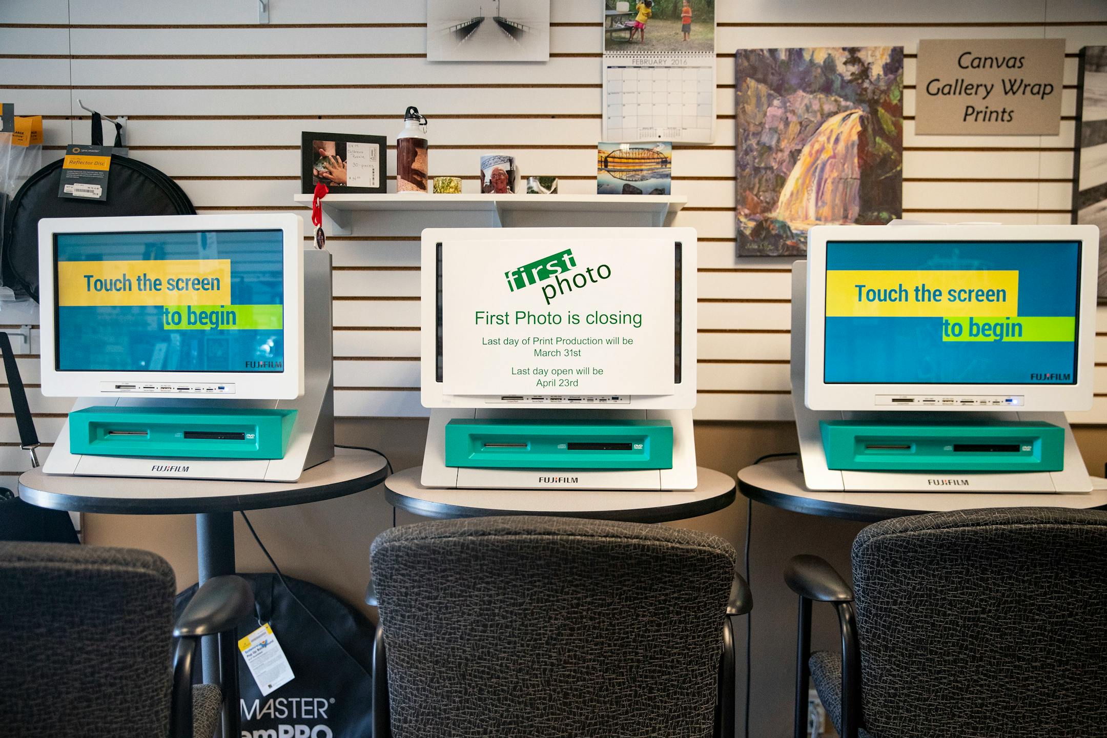 A sign marking the closing of the store was posted on one of the print ordering PCs in First Photo on Wednesday March 31, 2021.