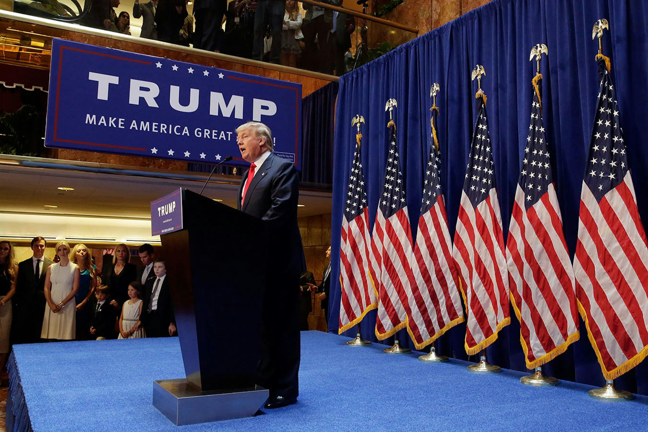 Developer Donald Trump announces that he seek the Republican nomination for president, Tuesday, June 16, 2015, in the lobby of Trump Tower in New York. (AP Photo/Richard Drew)