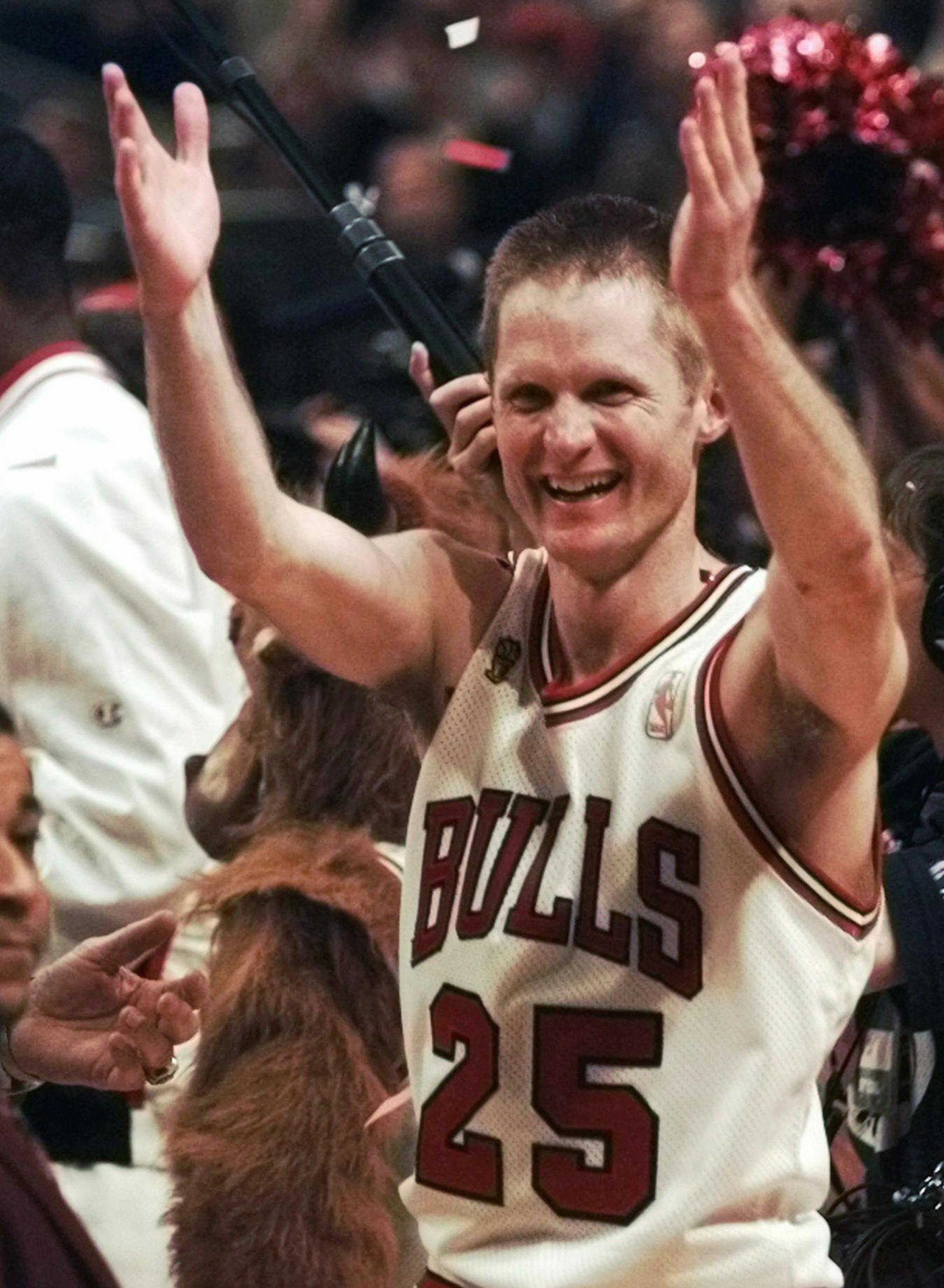 The Chicago Bulls' Steve Kerr celebrates after the Bulls beat the Utah Jazz 90-86 in Game 6 to win the NBA championship on Friday, June 13, 1997, in Chicago. Kerr hit a shot with five seconds left that put the Bulls ahead for good in the game. (AP Photo/Beth A. Keiser) ORG XMIT: CXA114
