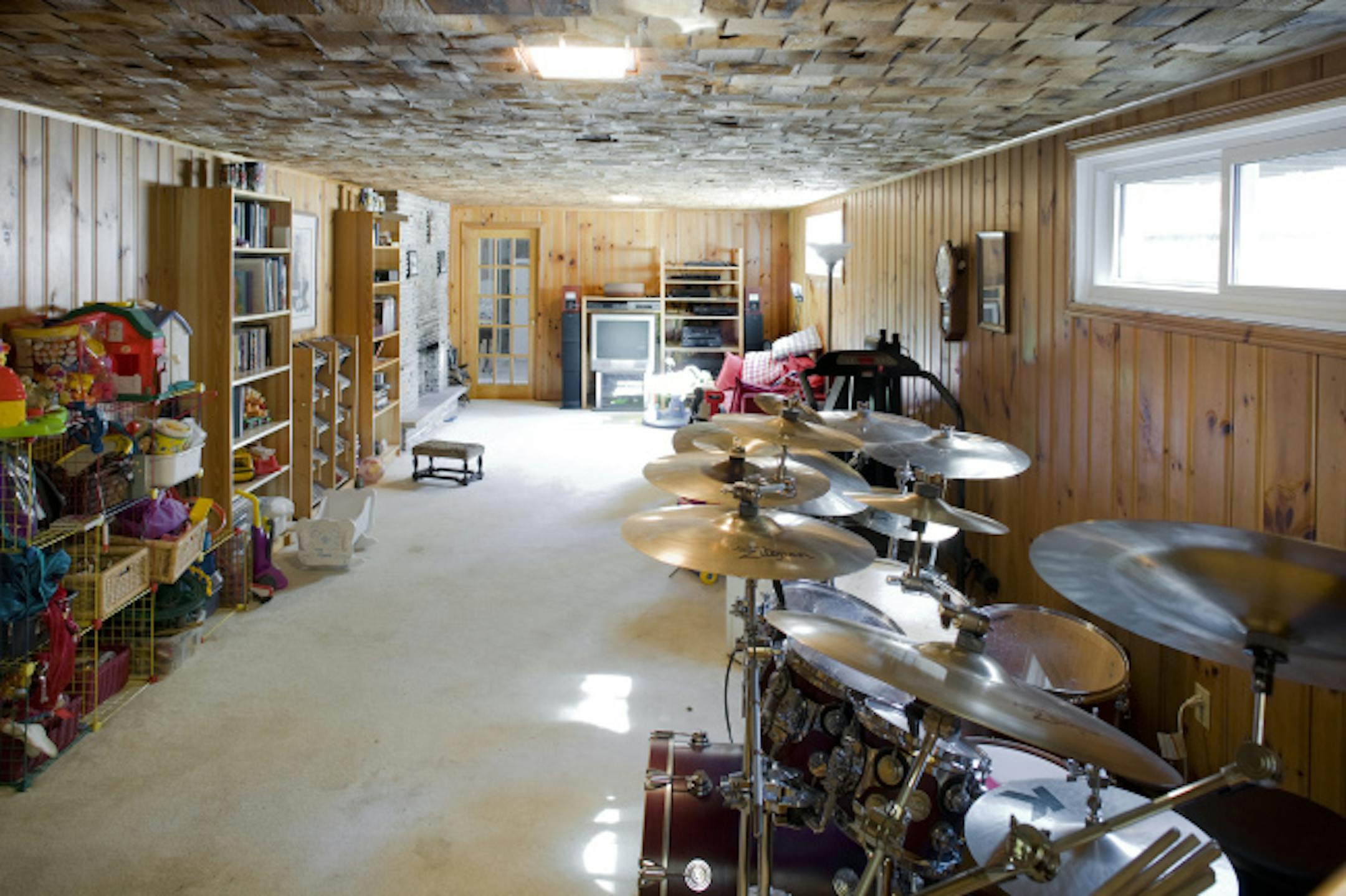 This basement man cave lacked soundproofing and appeal. It had space, but no one wanted to spend any time there.