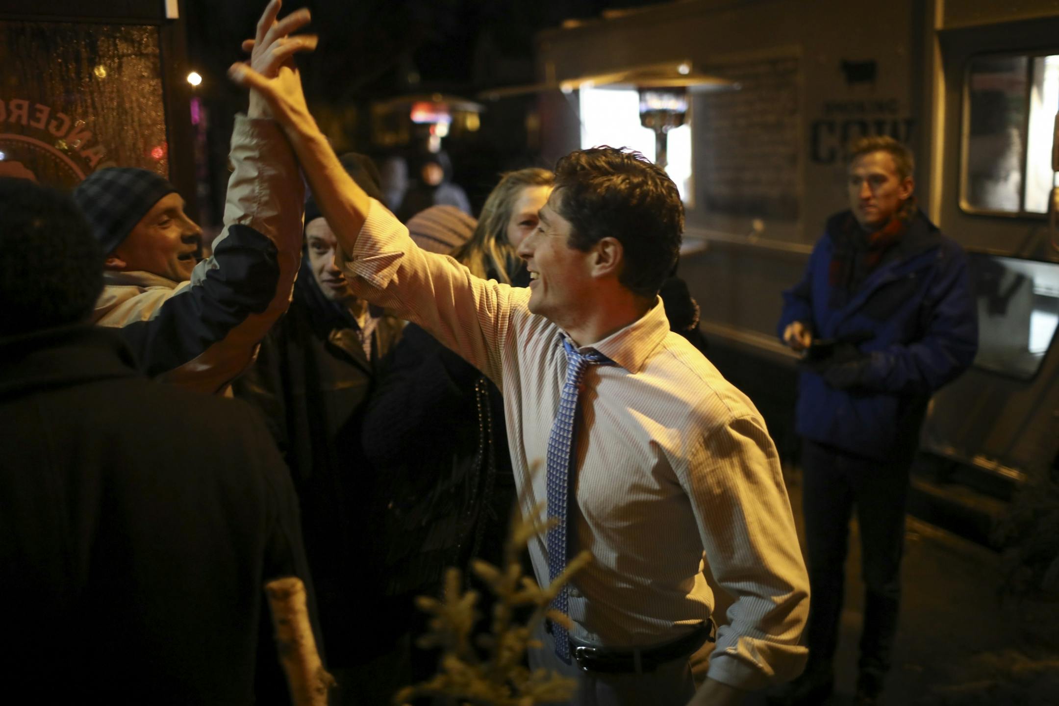 Jacob Frey high fived a supporter outside a packed Dangerous Man Brewing Co. taproom moments after he announced that he was seeking the job of Mayor of Minneapolis.