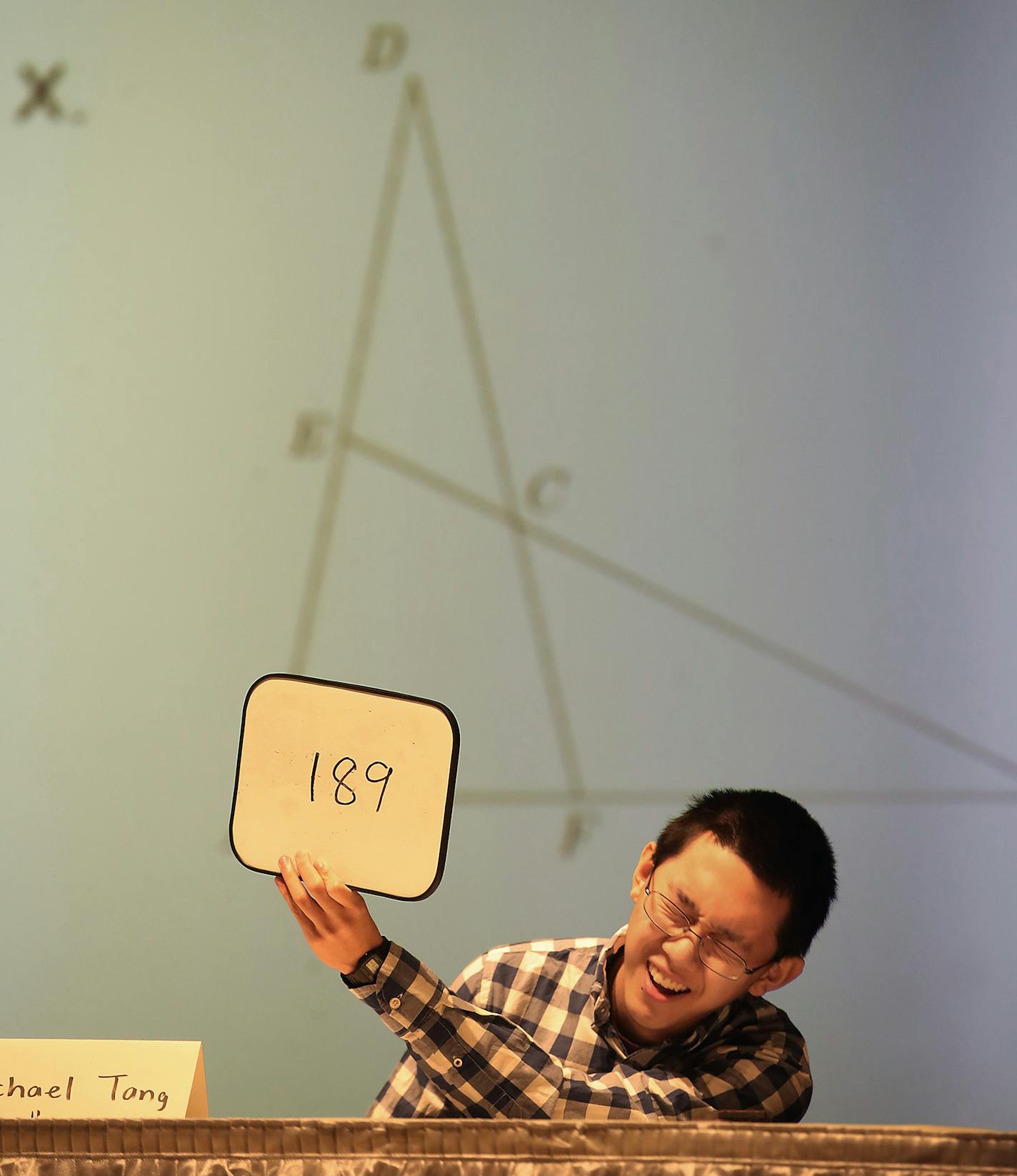 Three-time math bowl champion Michael Tang reacted after getting a math problem correct during the Minnesota State High School Mathematics League Tournament at South St. Paul High School, Monday, March 13, 2017 in South St. Paul, MN. ] ELIZABETH FLORES &#xef; liz.flores@startribune.com