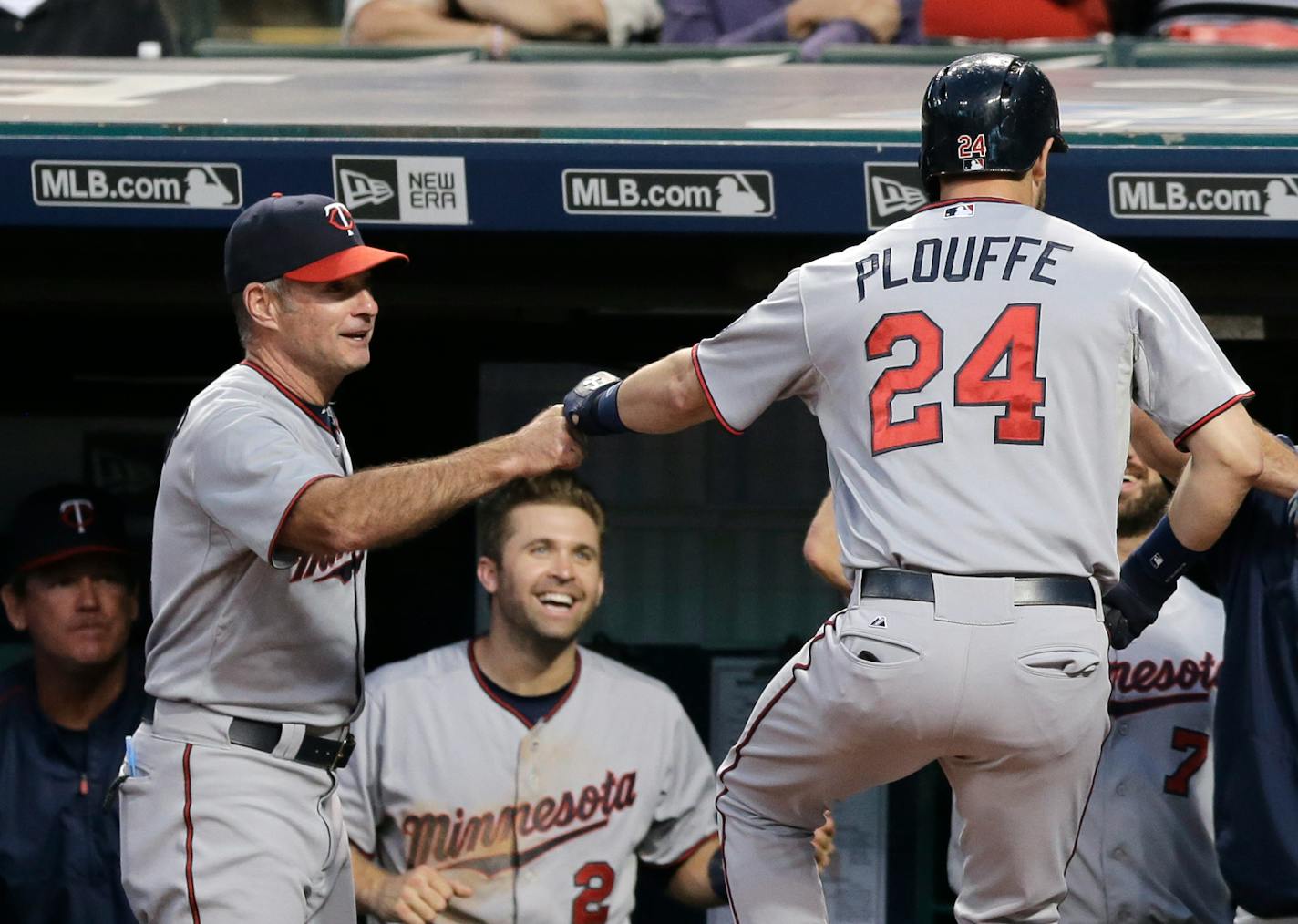 Twins manager Paul Molitor, left, congratulated Trevor Plouffe after Plouffe hit a two-run home run in the first inning of a game against the Indians in September 2015.