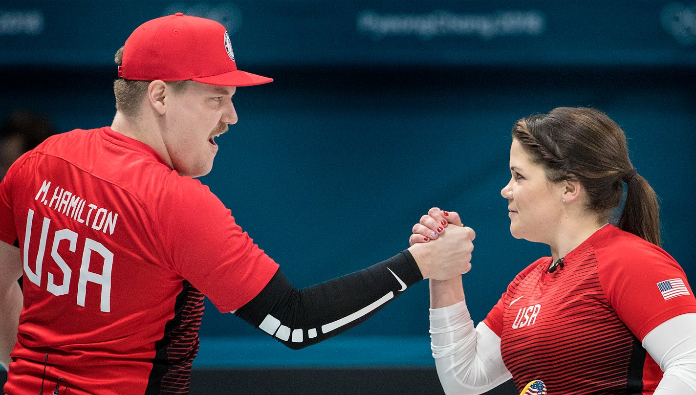 Matt and Becca Hamilton celebrated after beating the Athletes from Russia 9-3 in mixed pairs curling on Thursday, February 8, 2018 at the Gangneung Curling Center.