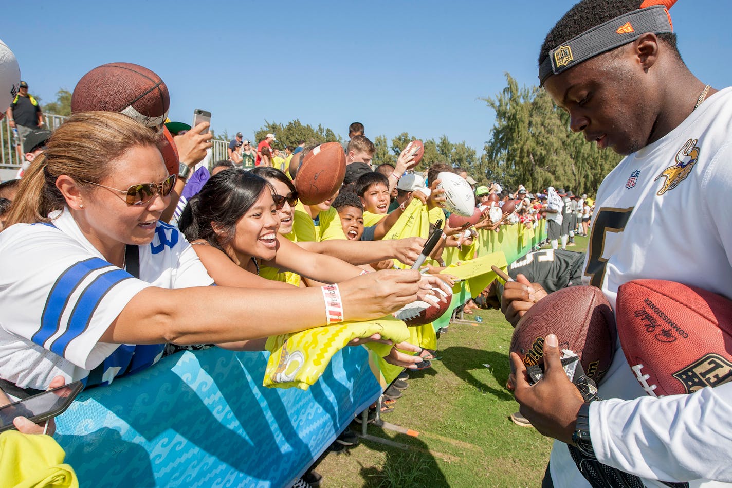 Vikings quarterback Teddy Bridgewater signed autographs for fans after an NFL Pro Bowl football practice.